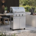 Bluegaz Z6 Gasolgrill står på uteplats framför bord med bänk